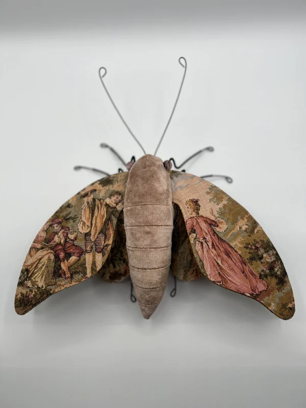 Vintage embroidered moths by Larysa Bernhardt featuring detailed tapestry