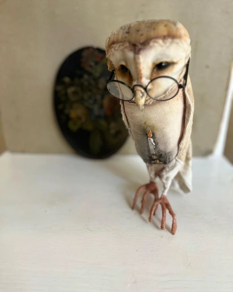 A vintage looking owl in reading glassed created by Disfairy