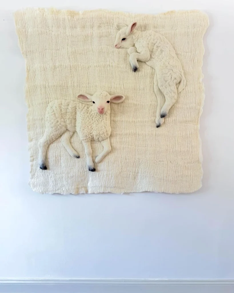 Felt Sculptured lambs by textile Holly Guertin who is inspired by animals