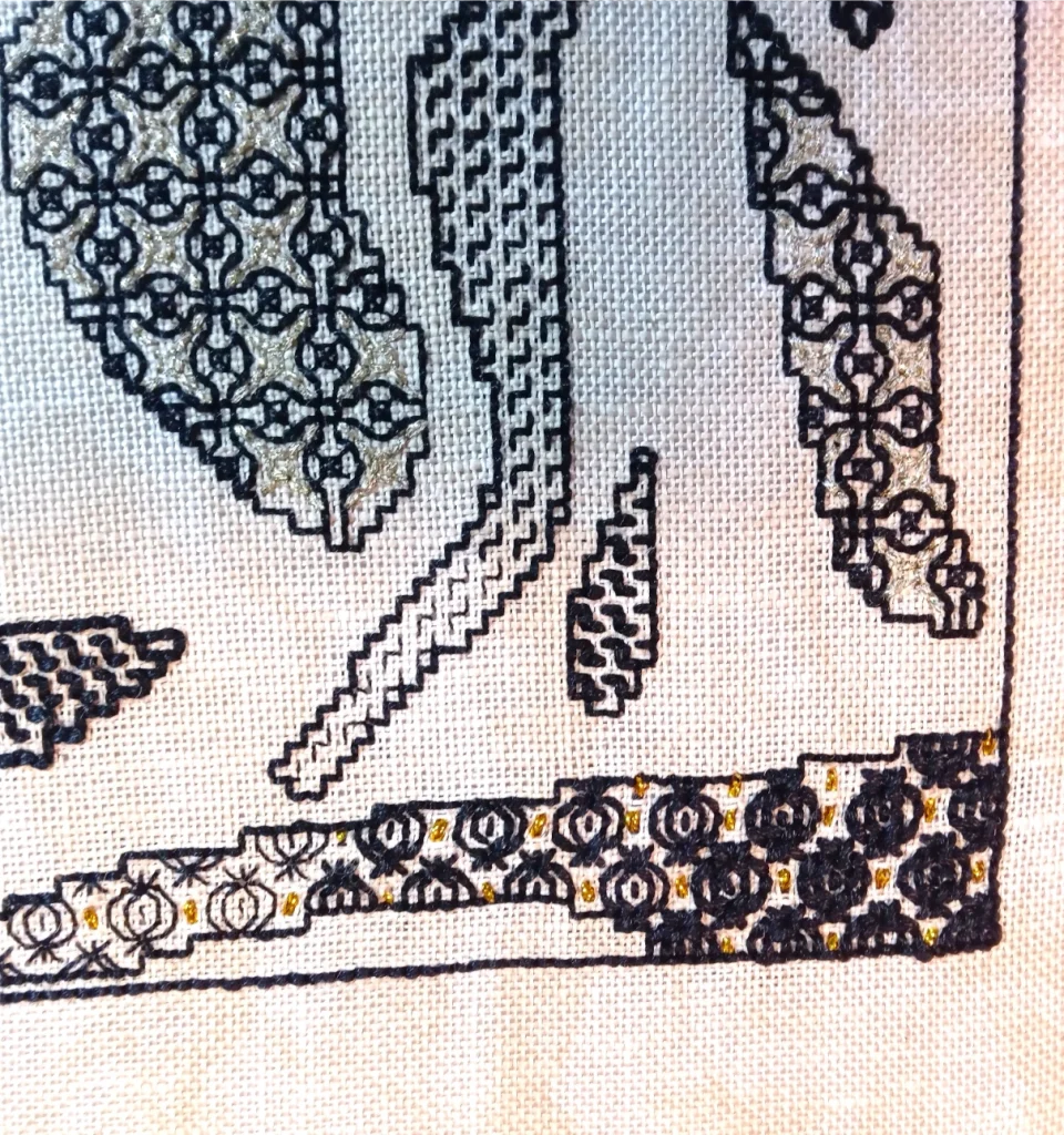 Close up detail of blackwork hand embroidery work by Judith Williams