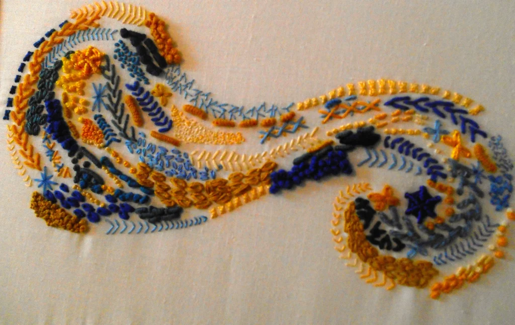 Isolated stitch ssampler hand embroidery work by Judith Williams