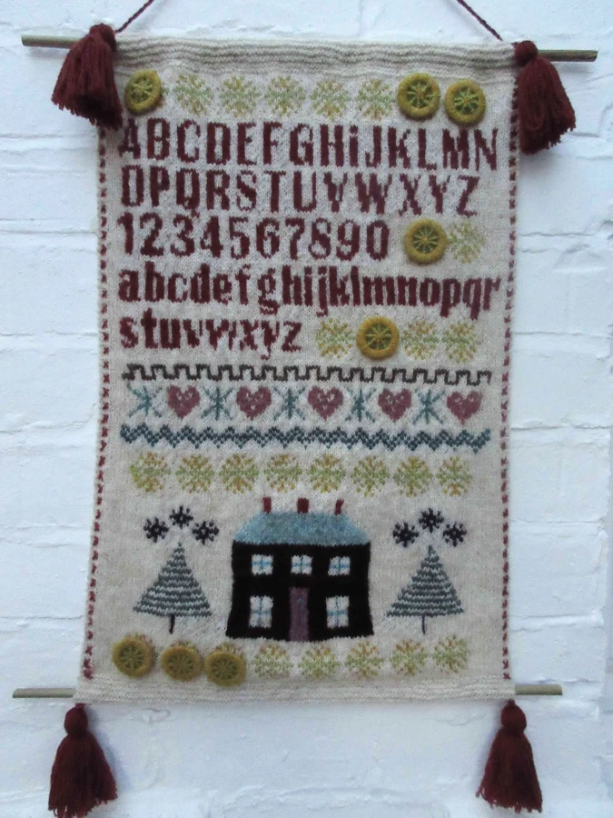 A knitted wall hanging by knitting graduate Lynn Hall