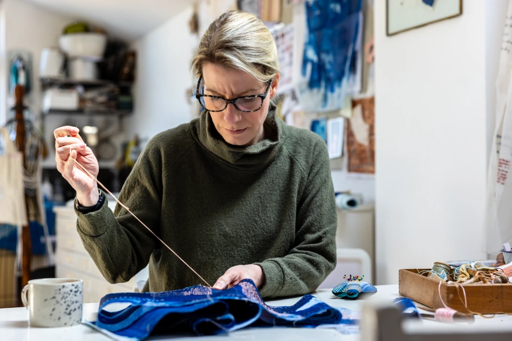 Hannah Lamb working in her studio