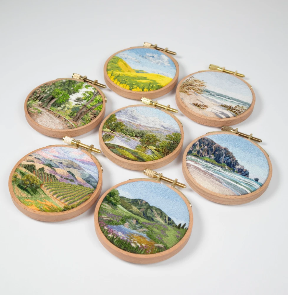 A collection of embroidery landscapes by Cassandra Dias