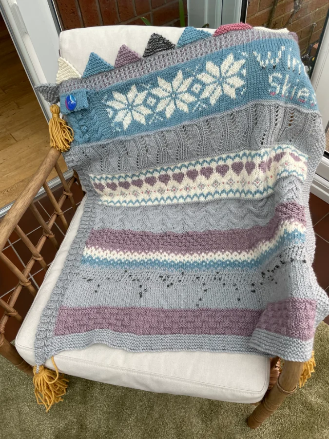 A beautiful and uniquely knitted blanket, knitting design, by SST Skill Stage 3 graduate Rhona
