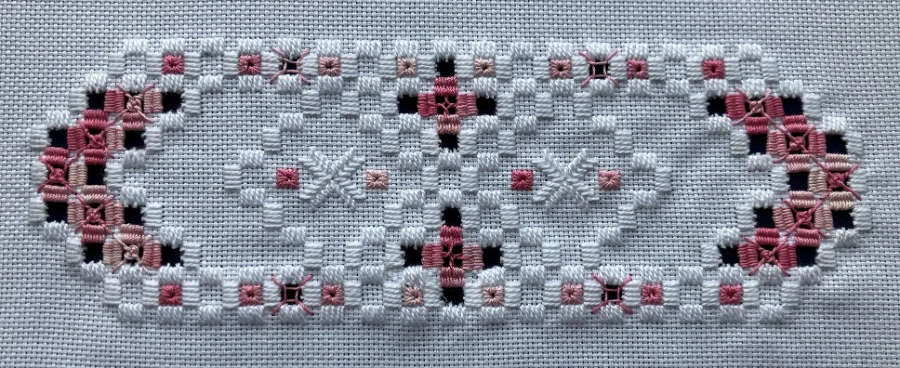Tea tray cloth hand embroidery stitching detail by SST Skill Stage 2 graduate Elaine Fraser